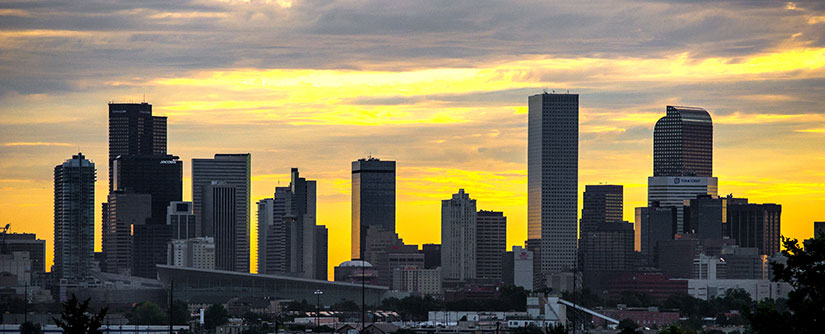 Sun rising over the downtown Denver skyline.