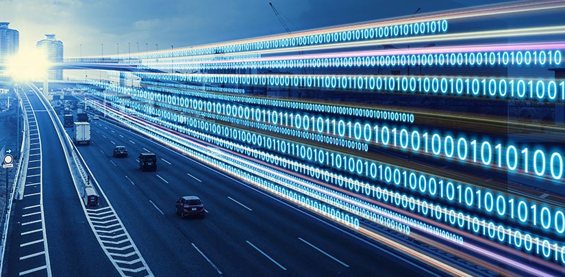 A stock image of numbers going across the sky next to cars on a freeway.