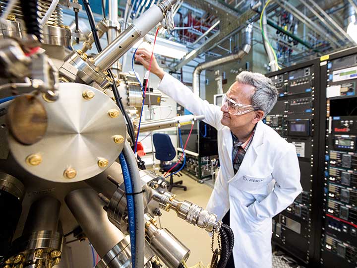 Photo of a scientist in NREL lab.