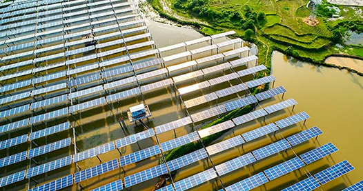 Solar panels on a body of water.