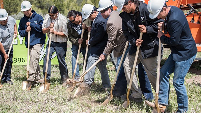 Image of people digging.