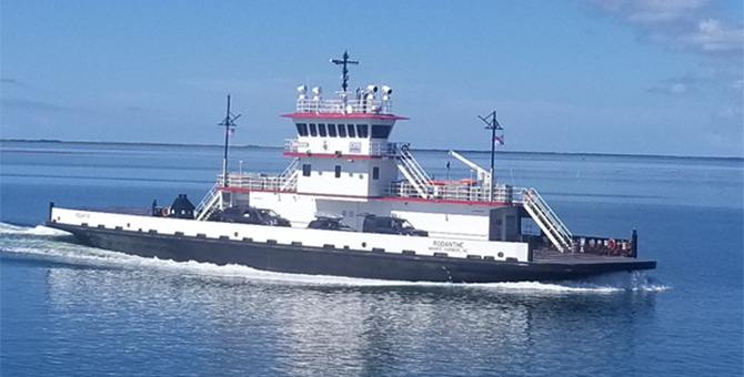 Ferry making its way across the ocean.