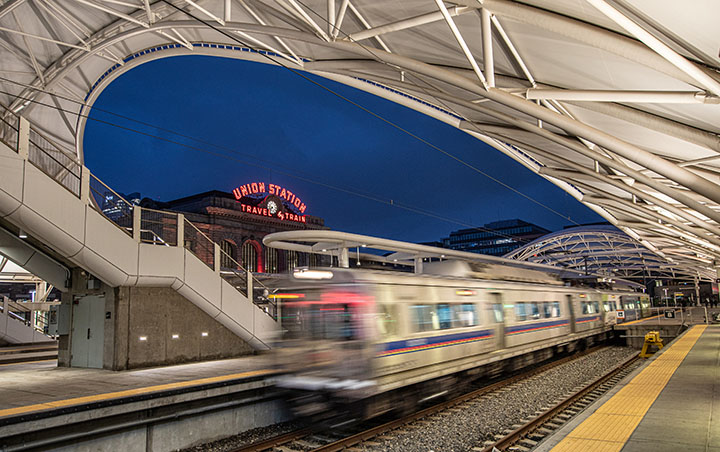 An Amtrak train departs Denver Union Station in Denver, Colorado