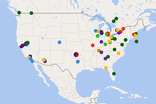 A map of North America with colorful dots.