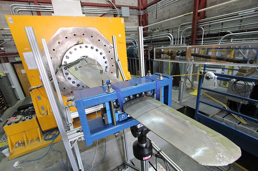 Photo of structural testing of a composite blade that is part of a tidal current marine and hydrokinetic system.